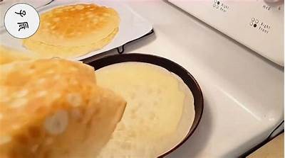 美味鸡蛋饼的制作秘籍，让你成为厨房里的糖心主播！